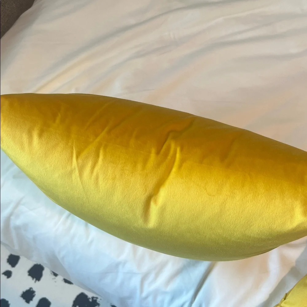Yellow velvet throw pillow